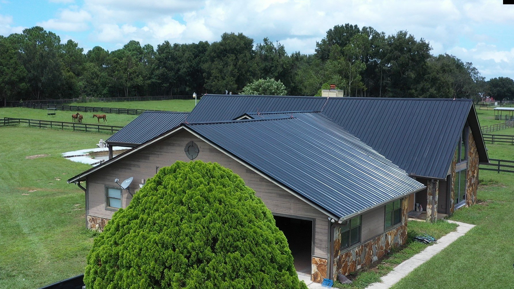 APC Roofing in Clermont, FL - Black Metal Roof